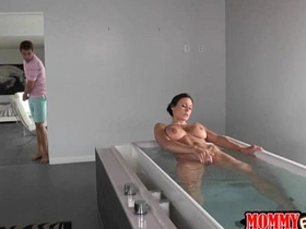 MILF with big breasts disciplines her teenage stepson for spying on her