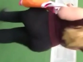 Stunningly big black woman's buttocks while strolling