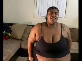 A black couple enjoys a hot sex session in the living room