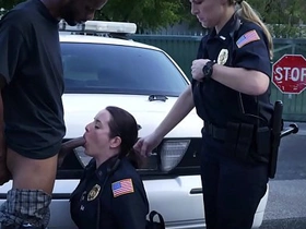Uniformed officers and their black colleague in a steamy encounter
