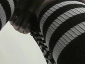 Young emo girl shows off her tattoos and naked body