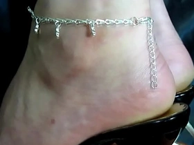 Seductive feet in tantalizing sandals and shoes