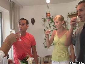 A woman pleasures her partner's penis and mouth simultaneously
