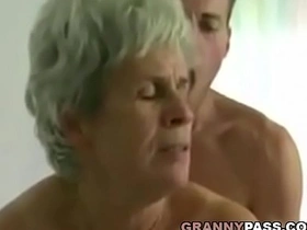 A young man has sex with an older woman with unshaven pubic hair