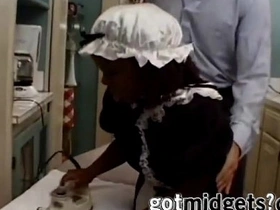 African American dwarf maid performs oral sex on her employer's penis